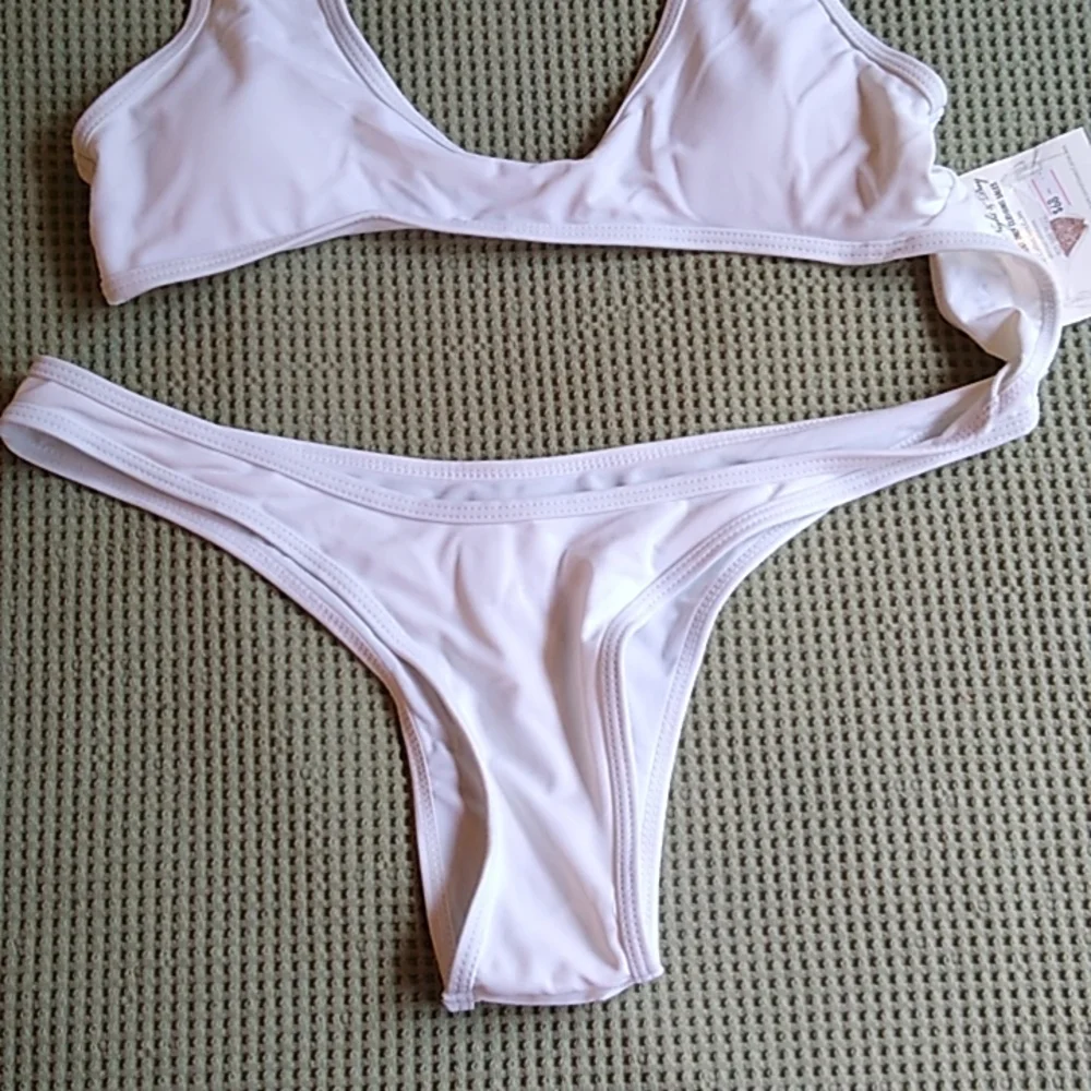 NWT Callie Lives White Cut Out Monokini Xena tiny top